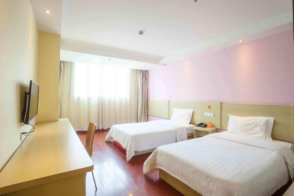 7Days Inn Meizhou Jia De Li Chambre photo